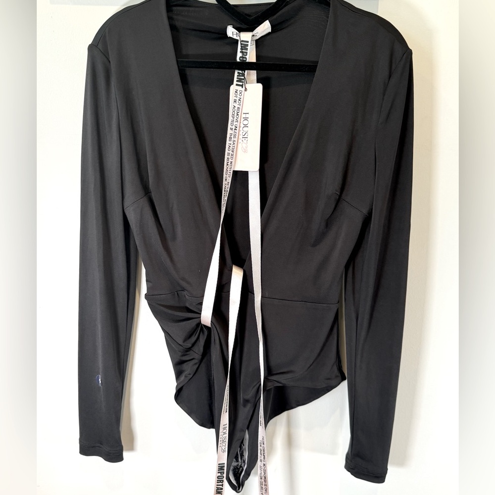 House of CB. Size S. New with tags. Black long sleeve bodysuit. Low in front.